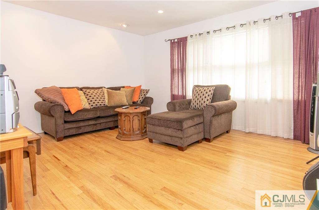 4 Harvard Road Old Bridge, NJ 08859 - Photo 5 of 18 a living room with furniture and a large window