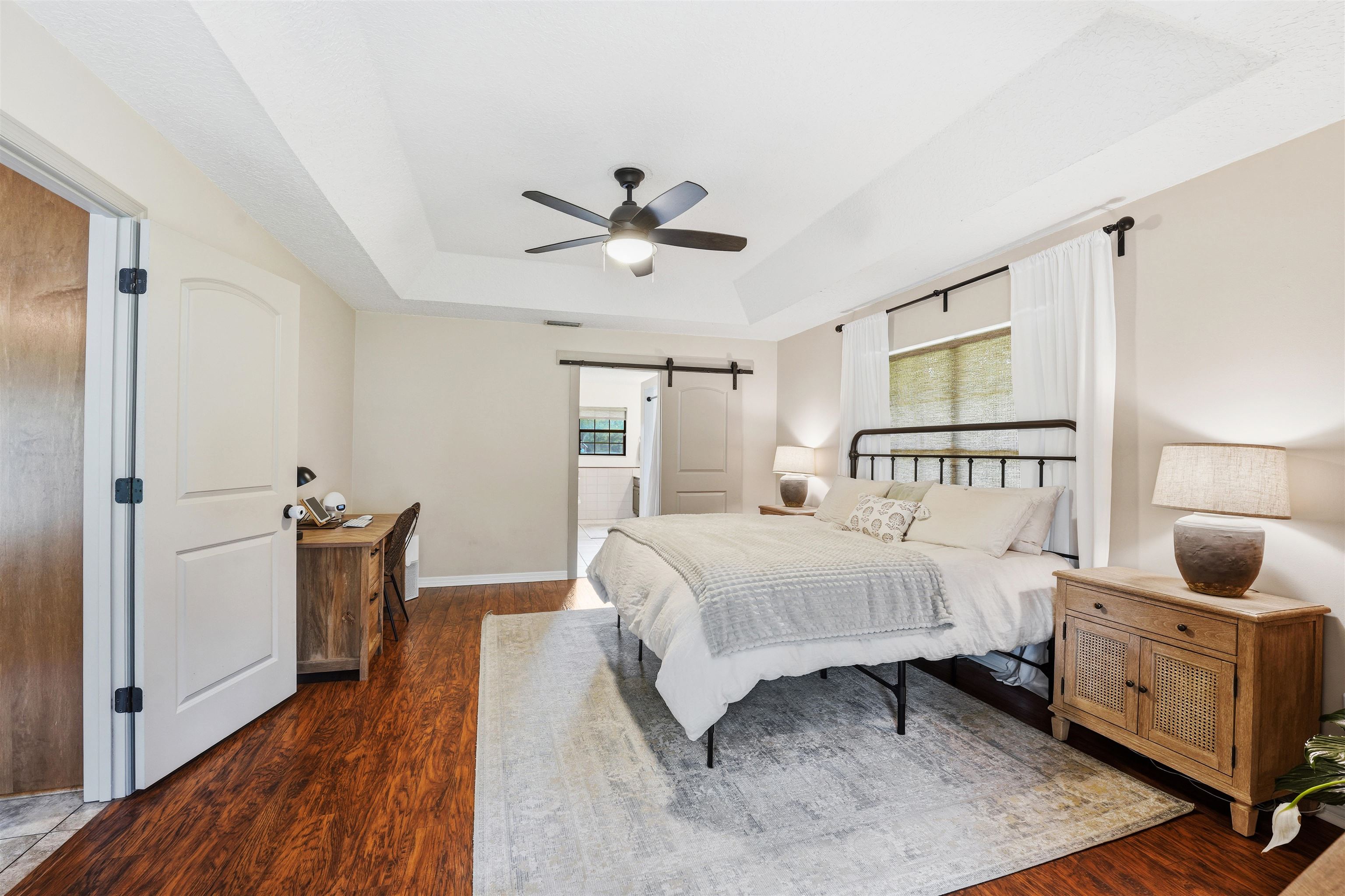 1805 Bennett Road St. Augustine, FL 32092 - Photo 22 of 65 a bedroom with a bed and wooden floor
