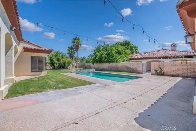 a house view with a outdoor space