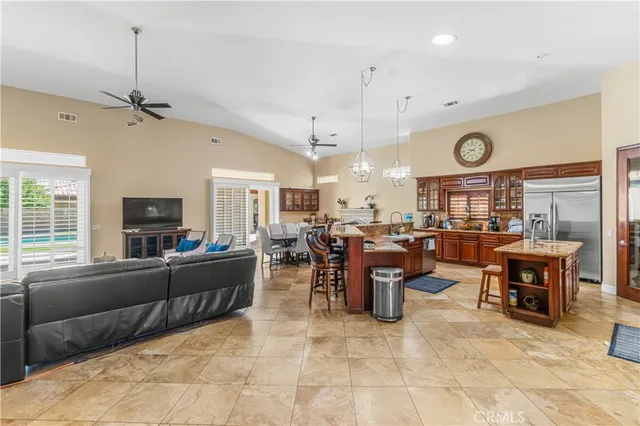 a living room with lots of furniture and lots of furniture