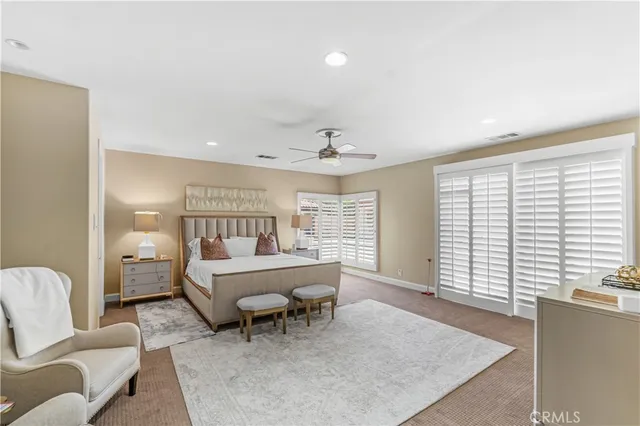 a bed room with a bed and a couch