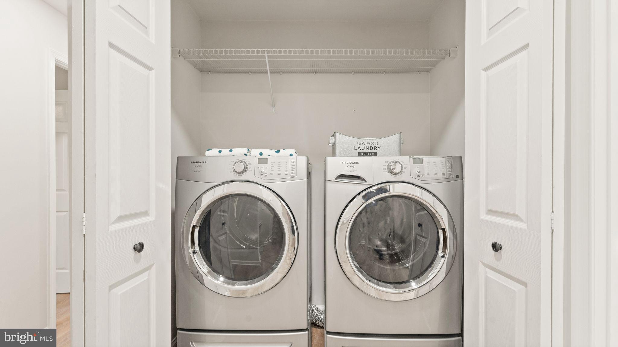 8309 Rolling Road Manassas, VA 20110 - Photo 53 of 70 a utility room with dryer and washer