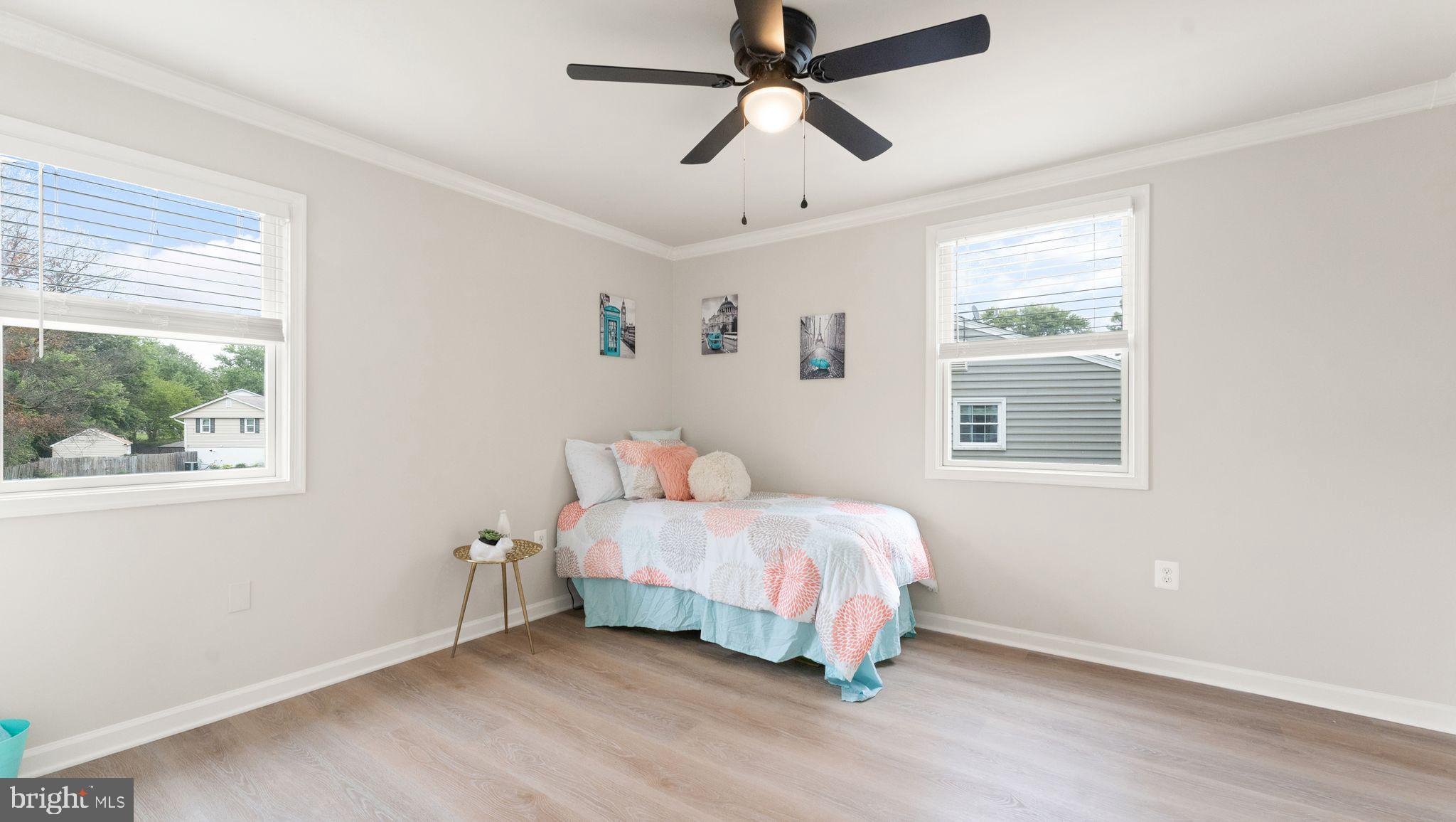 8309 Rolling Road Manassas, VA 20110 - Photo 54 of 70 a bedroom with a bed and a window