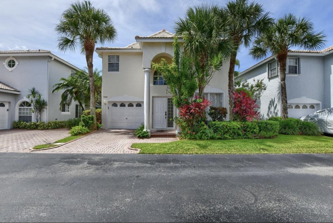 7299 Panache Way Boca Raton, FL 33433 - Photo 1 of 16 a front view of house with yard and green space
