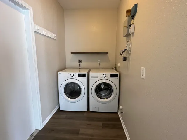 a utility room with dryer and washer