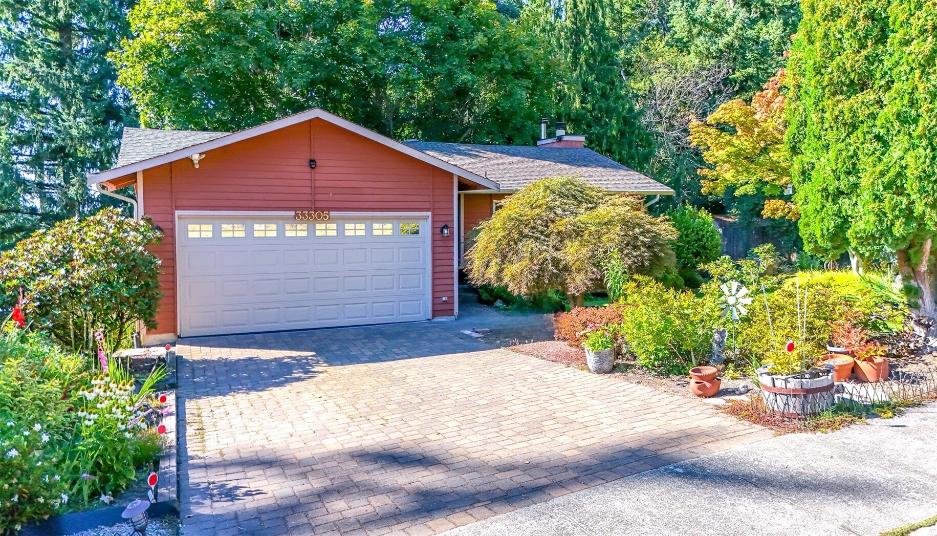 33305 41st Avenue Southwest Federal Way, WA 98023 - Photo 1 of 40 a front view of a house with a yard