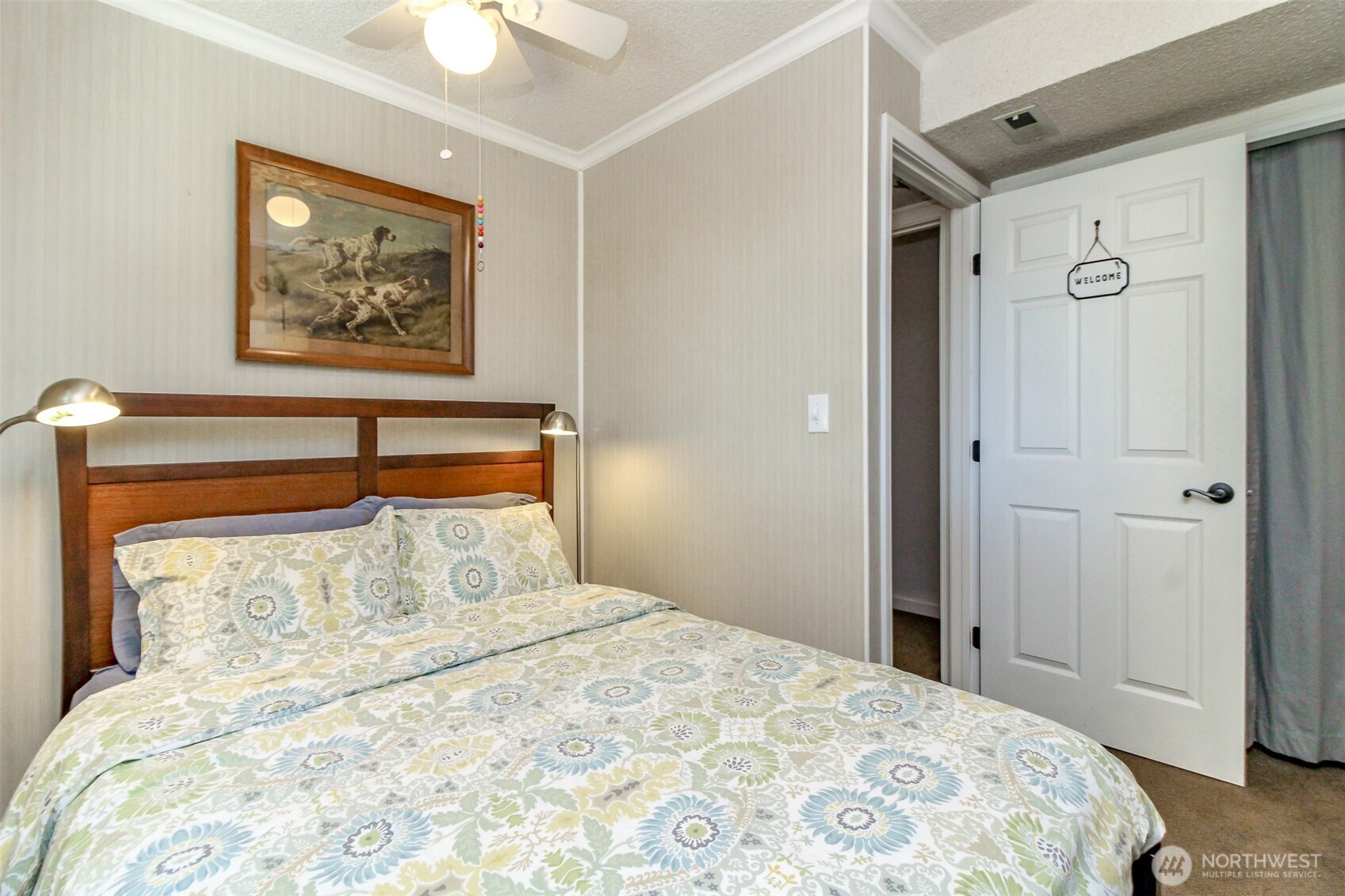 33305 41st Avenue Southwest Federal Way, WA 98023 - Photo 24 of 40 a bedroom with a bed and a painting on the wall