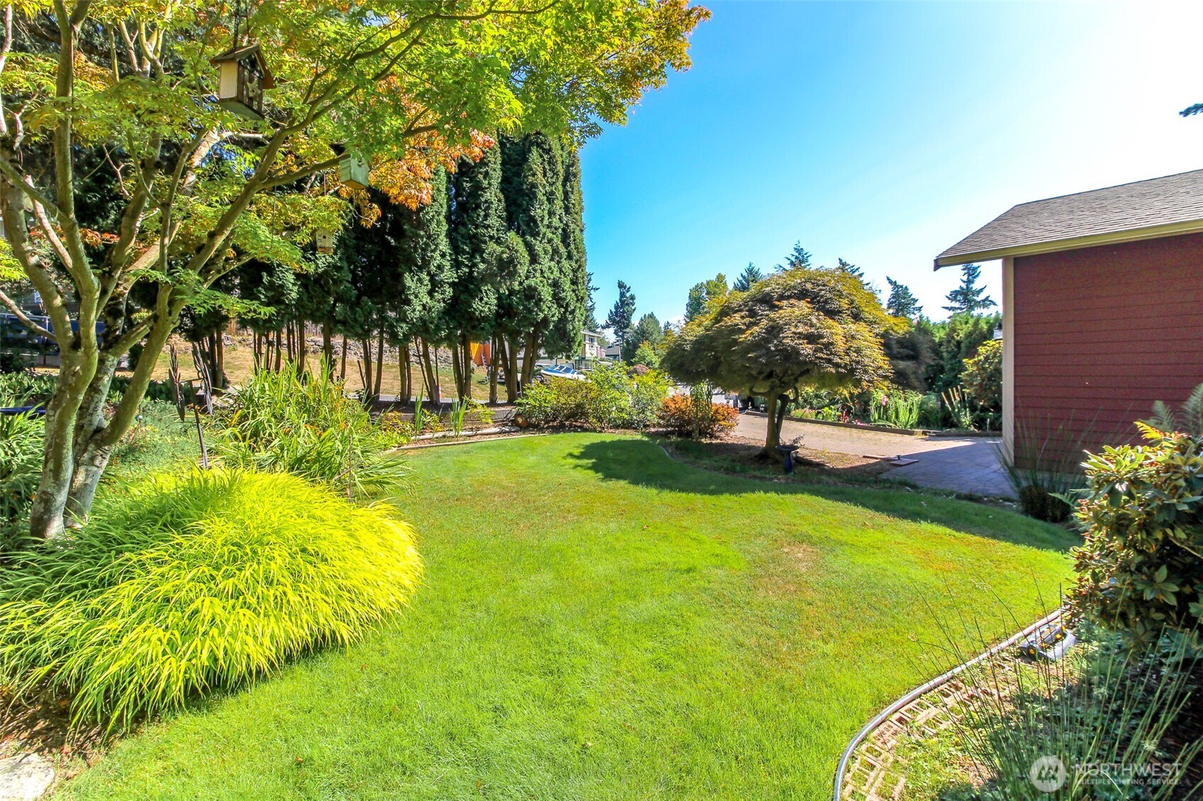 33305 41st Avenue Southwest Federal Way, WA 98023 - Photo 6 of 40 a view of a swimming pool with a garden