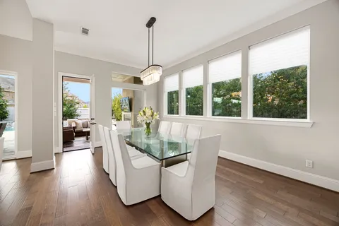 a view of living room with furniture and floor to ceiling windows