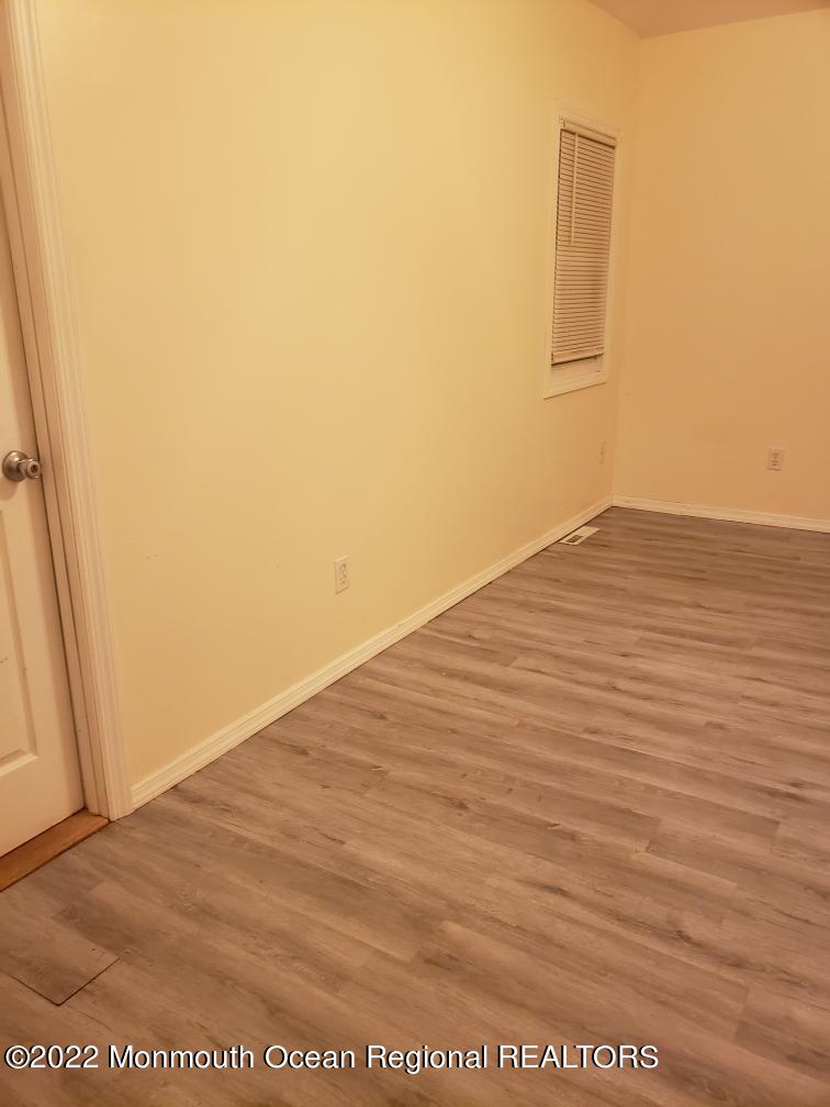 683 Mantoloking Road Brick, NJ 08723 - Photo 5 of 8 a view of wooden floor and a sink