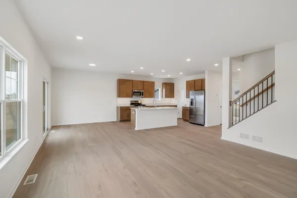 a view of kitchen with wooden floor