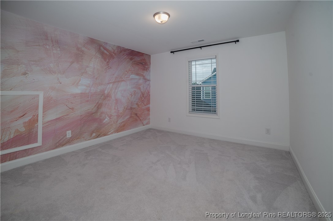 212 Stafford Avenue Raeford, NC 28376 - Photo 37 of 41 an empty room with windows
