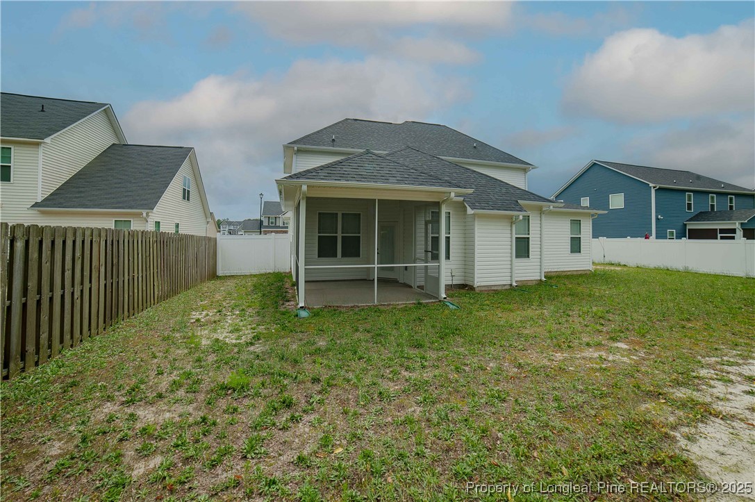 212 Stafford Avenue Raeford, NC 28376 - Photo 41 of 41 a view of a house with backyard and garden