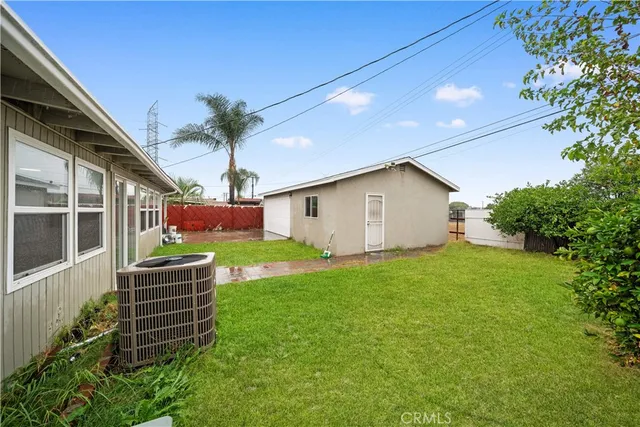 a house view with a garden space