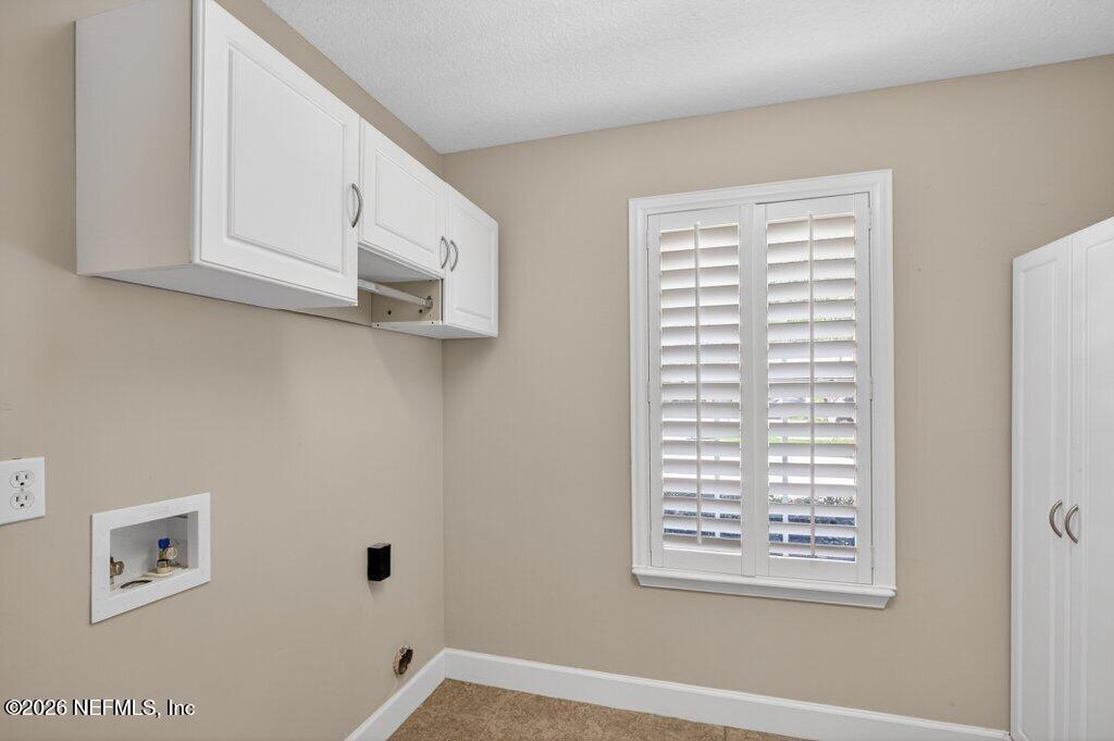 1664 Fairway Ridge Drive Fleming Island, FL 32003 - Photo 15 of 103 a view of an empty room with window