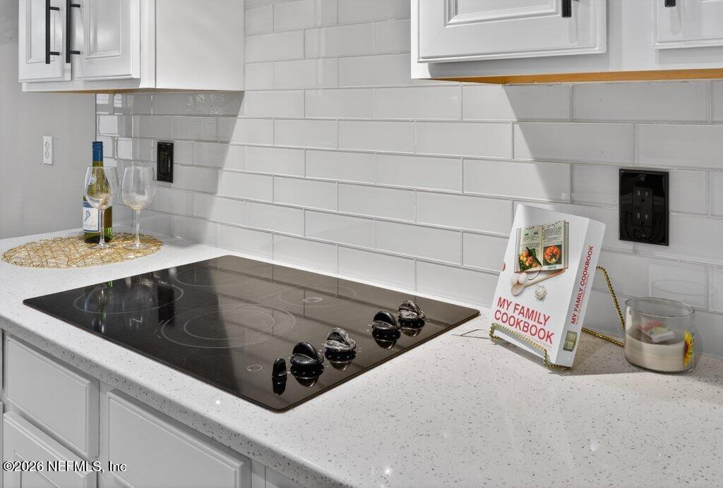 1664 Fairway Ridge Drive Fleming Island, FL 32003 - Photo 21 of 103 a kitchen with a stove and a sink