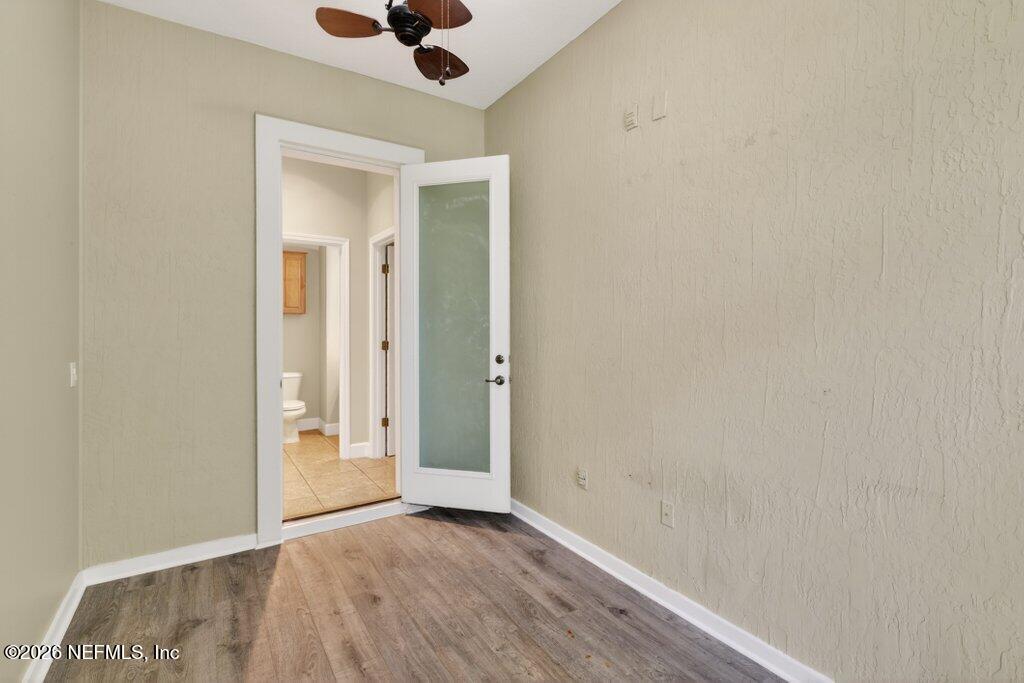 1664 Fairway Ridge Drive Fleming Island, FL 32003 - Photo 40 of 103 an empty room with closet and a chandelier fan