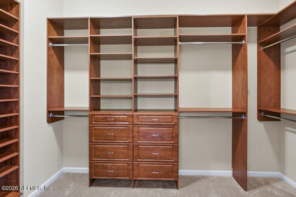 1664 Fairway Ridge Drive Fleming Island, FL 32003 - Photo 49 of 103 a view of walk in closet with empty racks