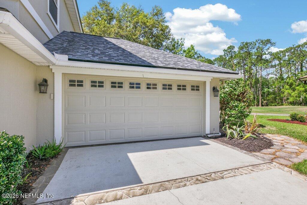 1664 Fairway Ridge Drive Fleming Island, FL 32003 - Photo 5 of 103 a view of a house with a garage