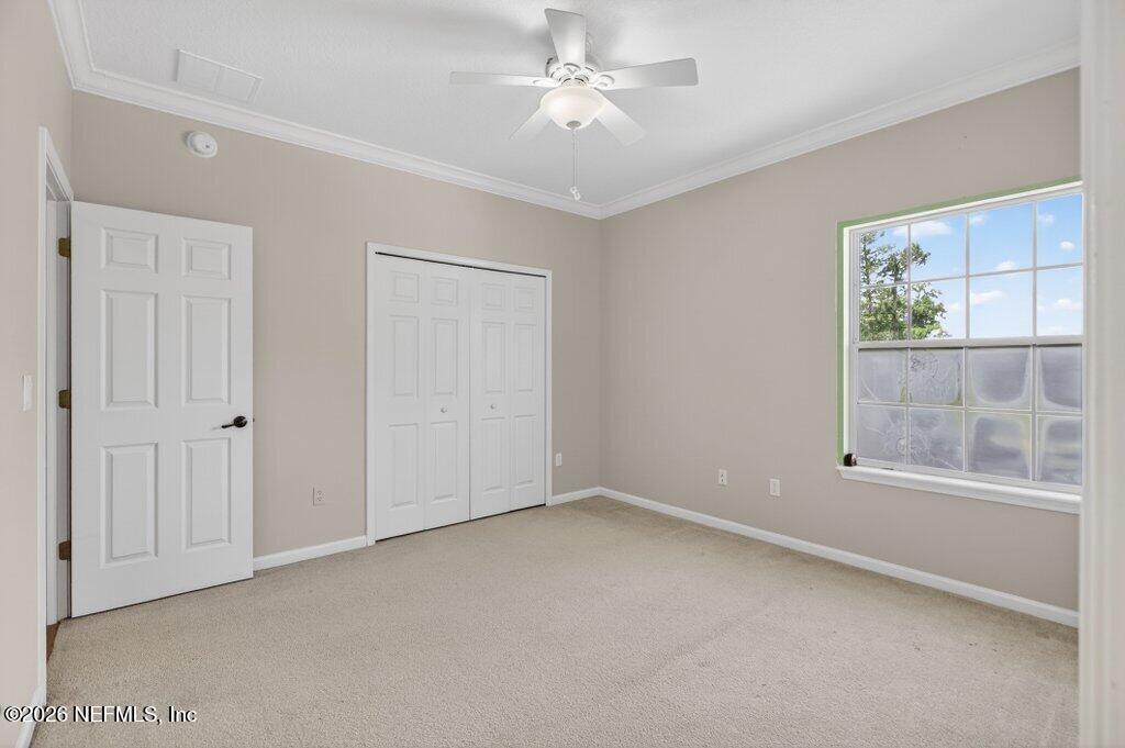 1664 Fairway Ridge Drive Fleming Island, FL 32003 - Photo 66 of 103 an empty room with a window