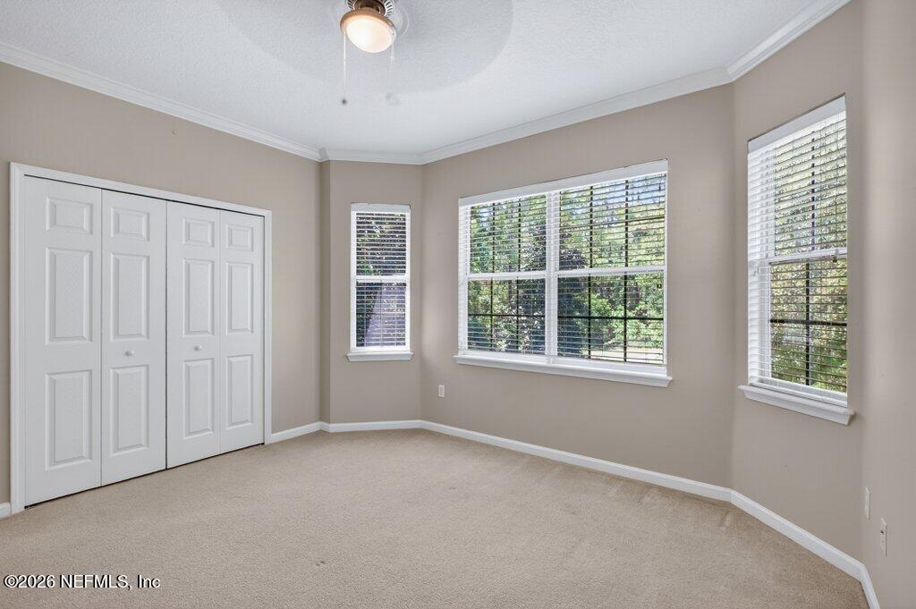 1664 Fairway Ridge Drive Fleming Island, FL 32003 - Photo 70 of 103 a view of an empty room with a window