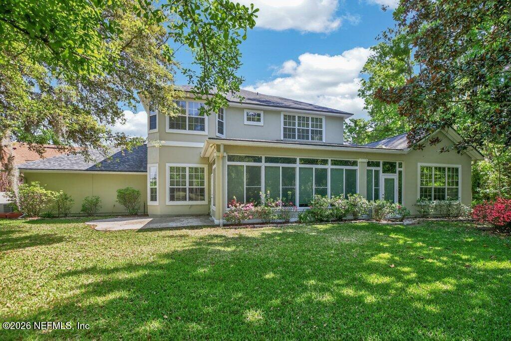 1664 Fairway Ridge Drive Fleming Island, FL 32003 - Photo 74 of 103 front view of a house with a yard