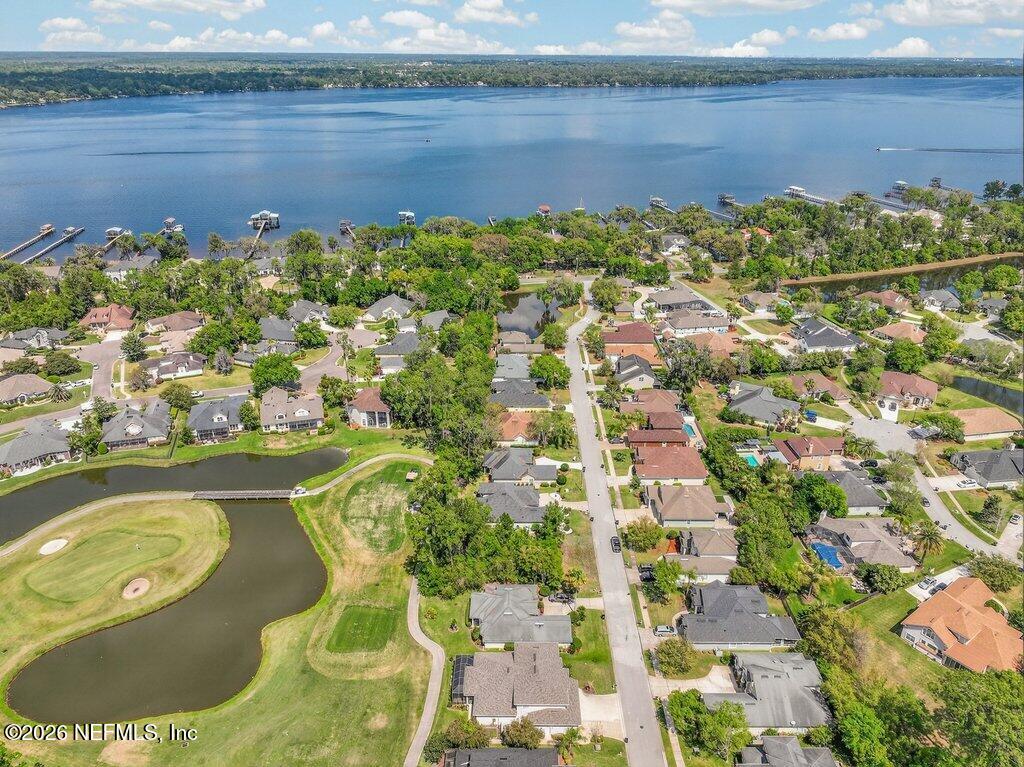 1664 Fairway Ridge Drive Fleming Island, FL 32003 - Photo 89 of 103 a view of a lake with a mountain in the background