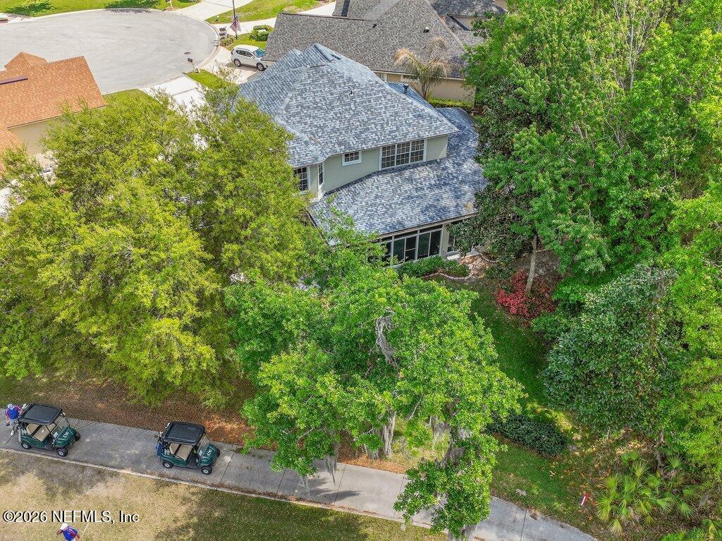 1664 Fairway Ridge Drive Fleming Island, FL 32003 - Photo 95 of 103 an aerial view of a house with a yard