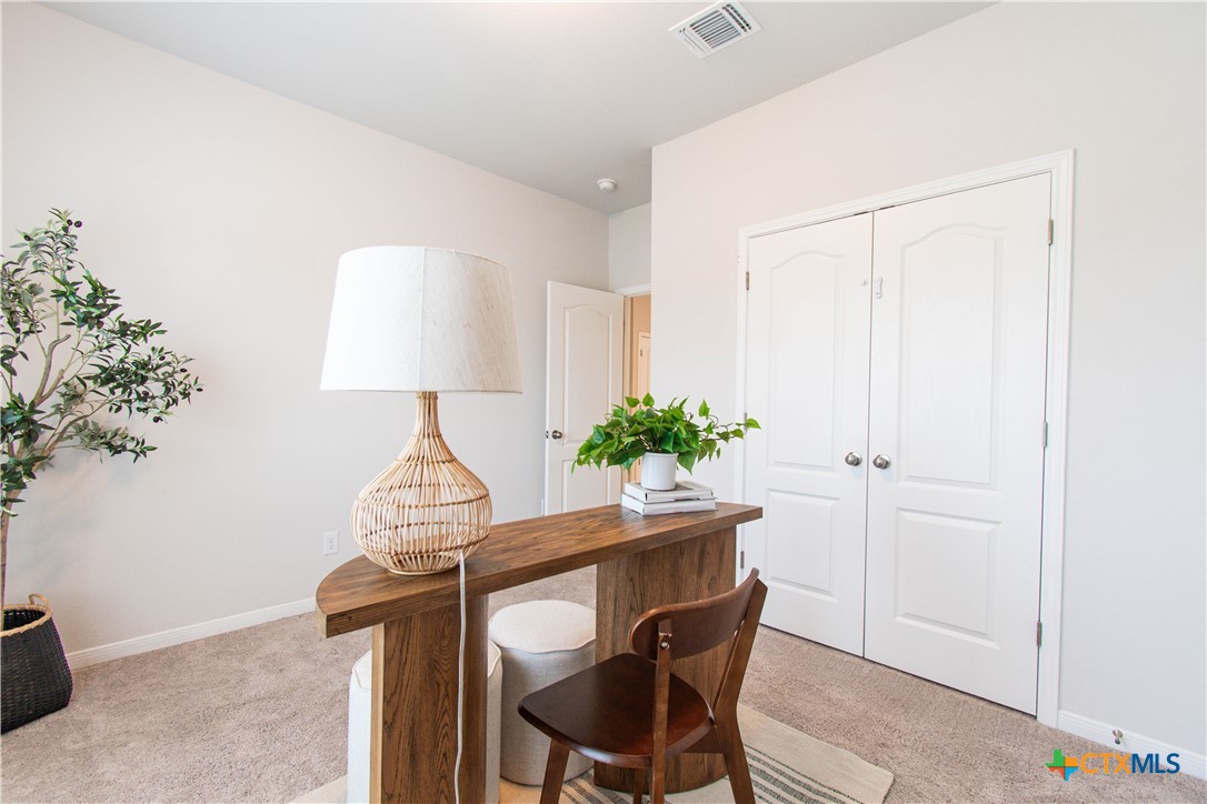 736 Jersey Court Troy, TX 76579 - Photo 15 of 32 a dining room with furniture and wooden floor
