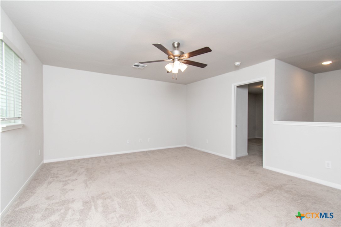 736 Jersey Court Troy, TX 76579 - Photo 18 of 32 wooden floor in an empty room with a window