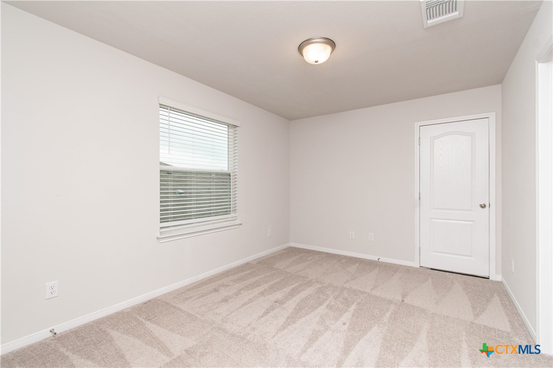 736 Jersey Court Troy, TX 76579 - Photo 20 of 32 an empty room with a window