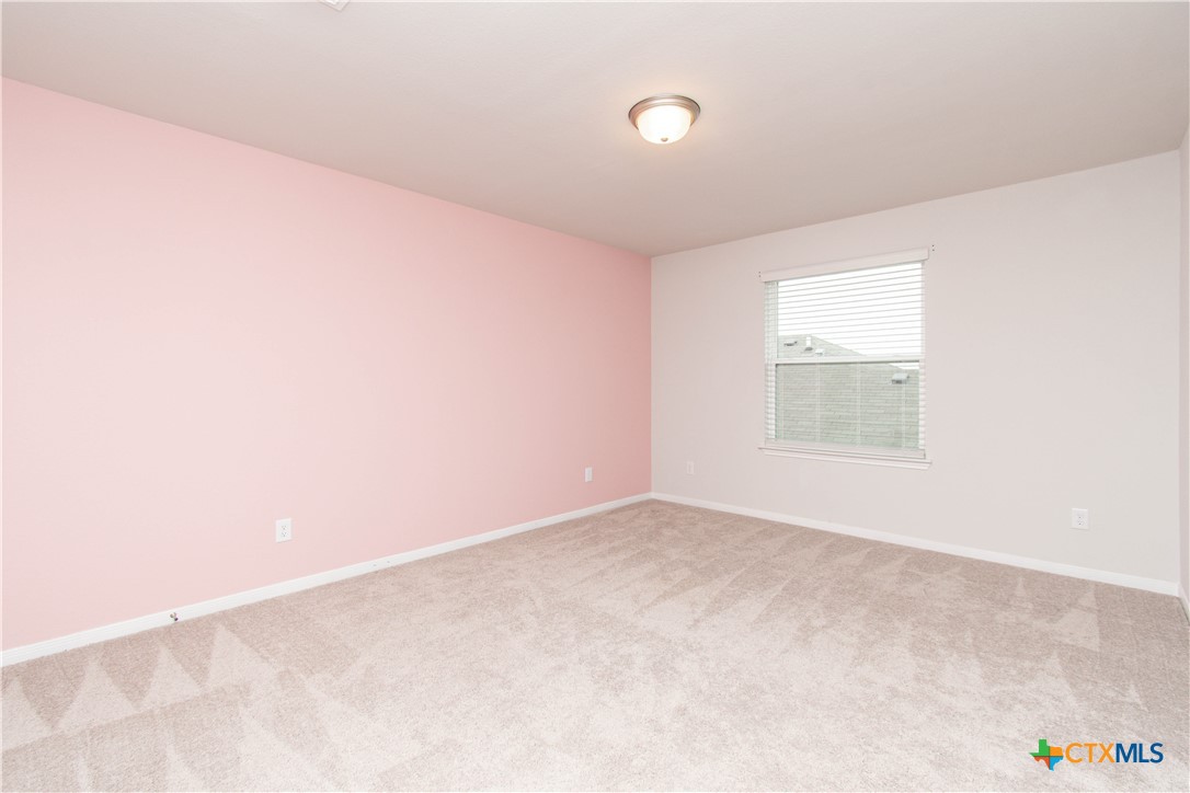 736 Jersey Court Troy, TX 76579 - Photo 29 of 32 an empty room with a window