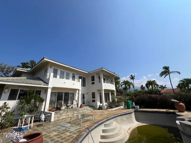 a front view of a house with patio