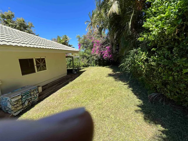 a view of back yard of the house