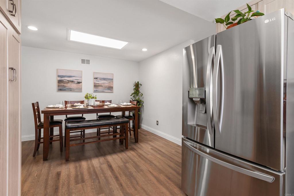 2046 Ups Circle Oceanside, CA 92054 - Photo 15 of 35 a view of a dining room with furniture window and wooden floor