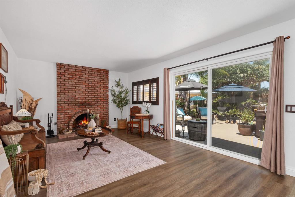 2046 Ups Circle Oceanside, CA 92054 - Photo 18 of 35 a living room with furniture floor and a large window