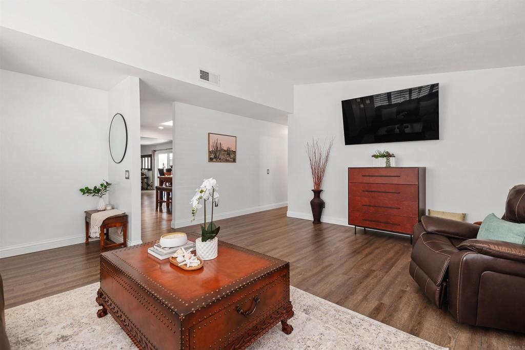 2046 Ups Circle Oceanside, CA 92054 - Photo 10 of 35 a living room with furniture and a flat screen tv