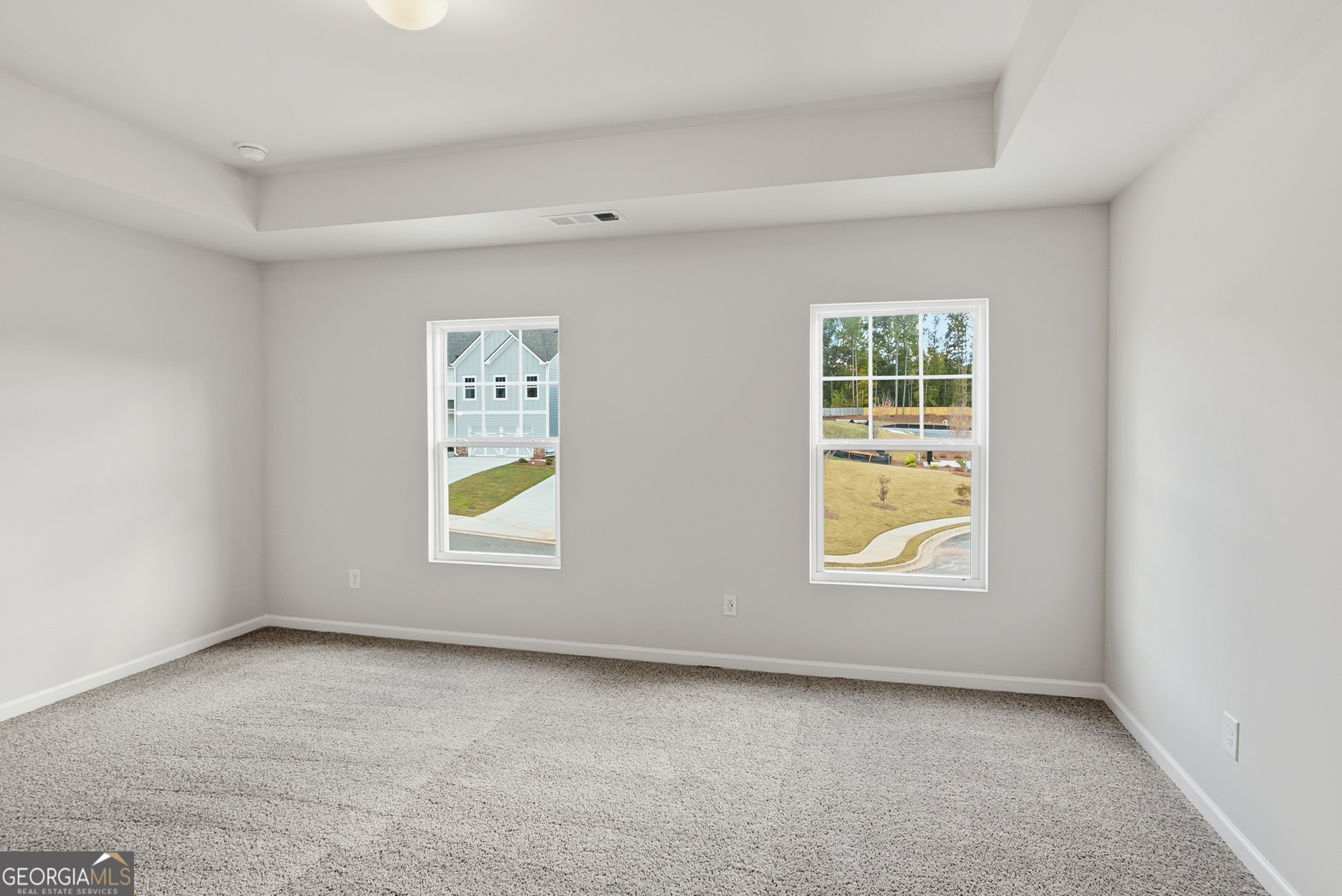 30 Umber Lane Newnan, GA 30263 - Photo 18 of 33 an empty room with windows and entrance