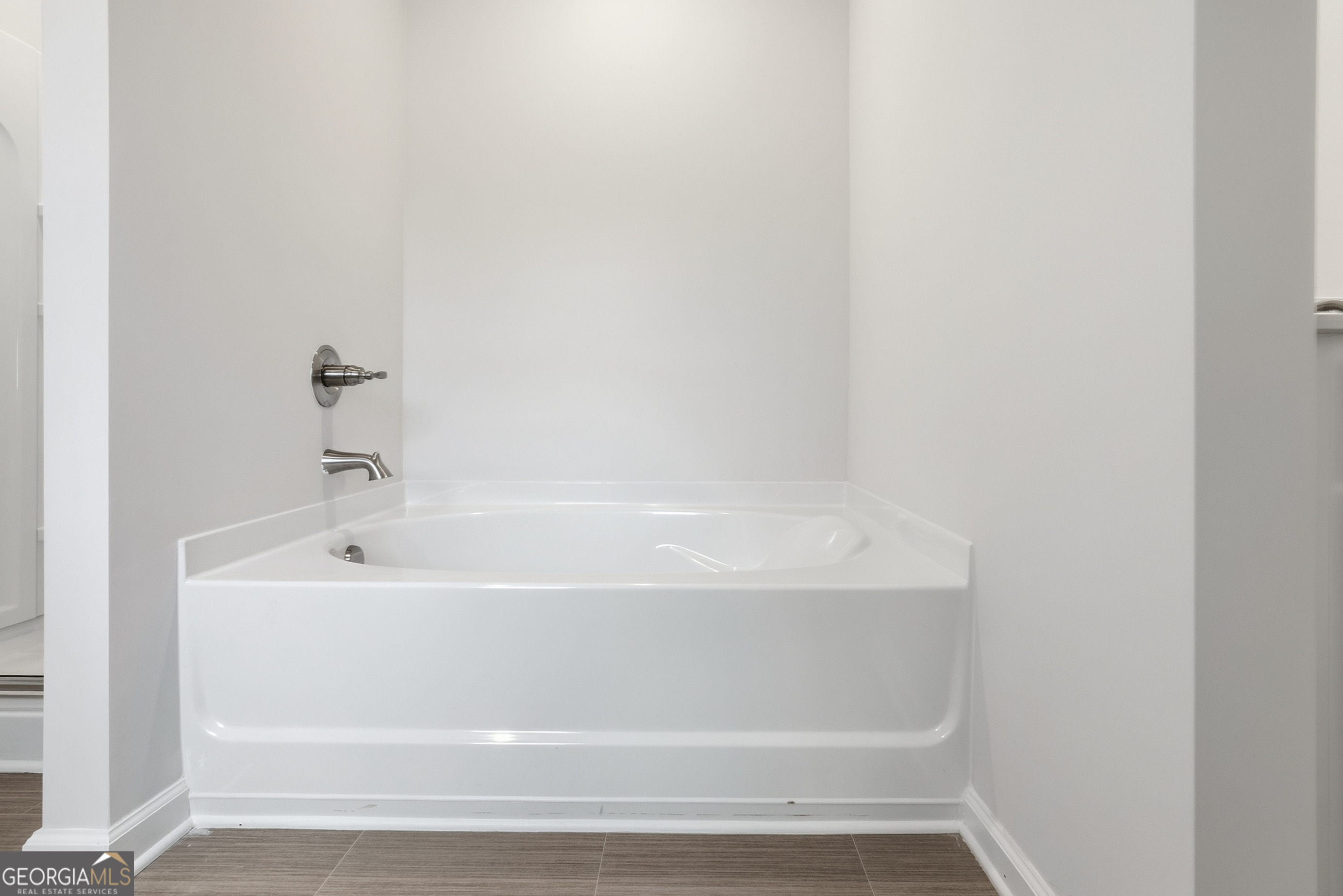 30 Umber Lane Newnan, GA 30263 - Photo 24 of 33 a close up view of a bathtub in a bathroom