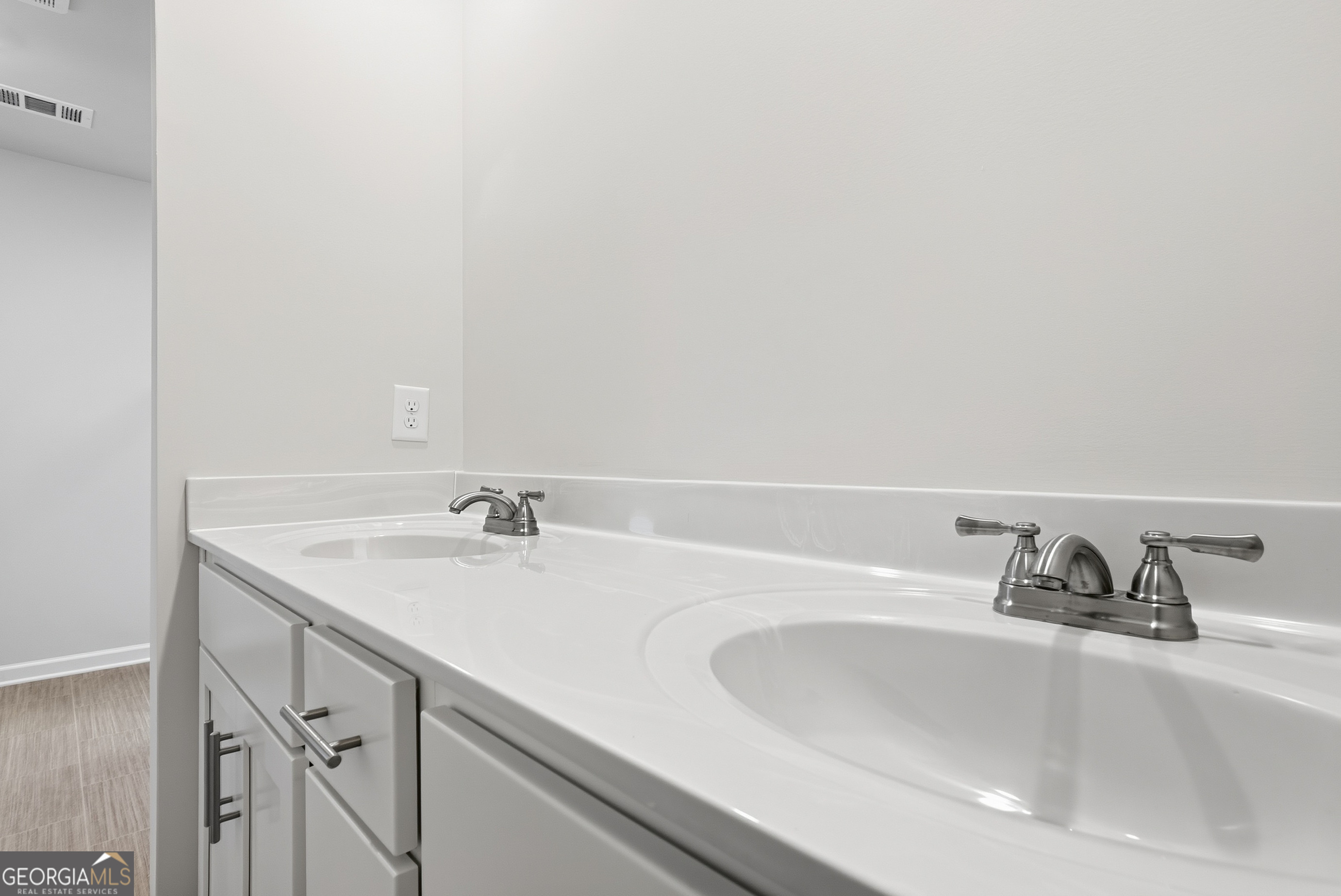 30 Umber Lane Newnan, GA 30263 - Photo 26 of 33 a bathroom with a sink and a window