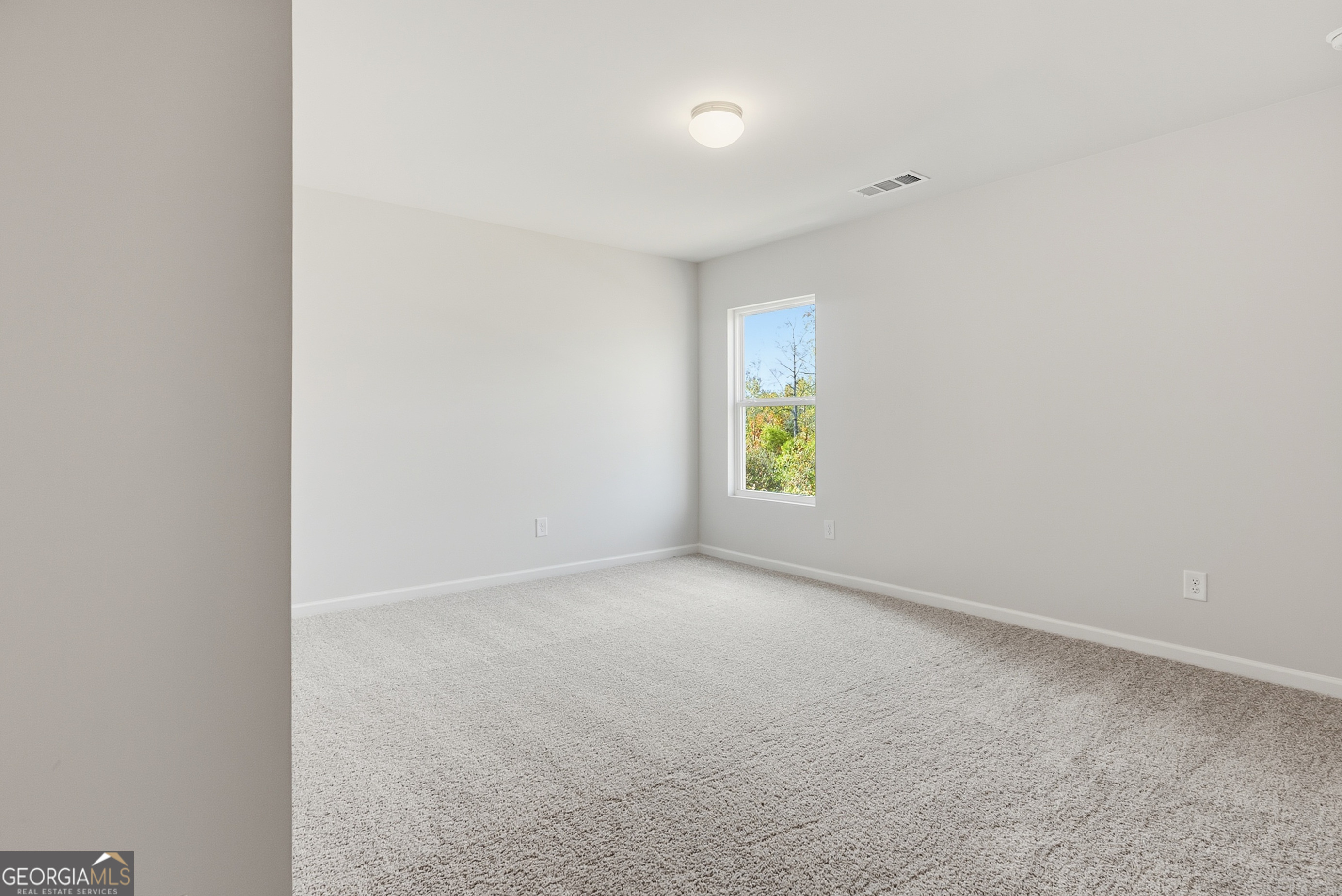 30 Umber Lane Newnan, GA 30263 - Photo 28 of 33 a view of an empty room with a window