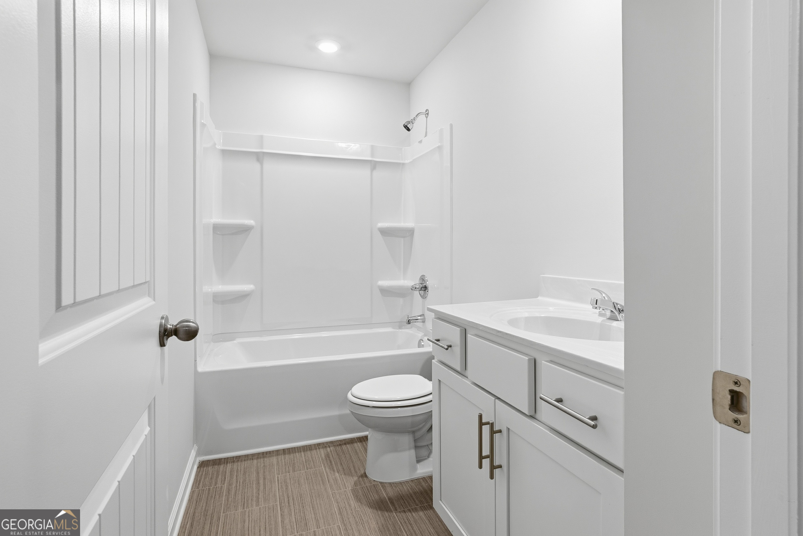 30 Umber Lane Newnan, GA 30263 - Photo 33 of 33 a bathroom with a toilet a sink and a bathtub