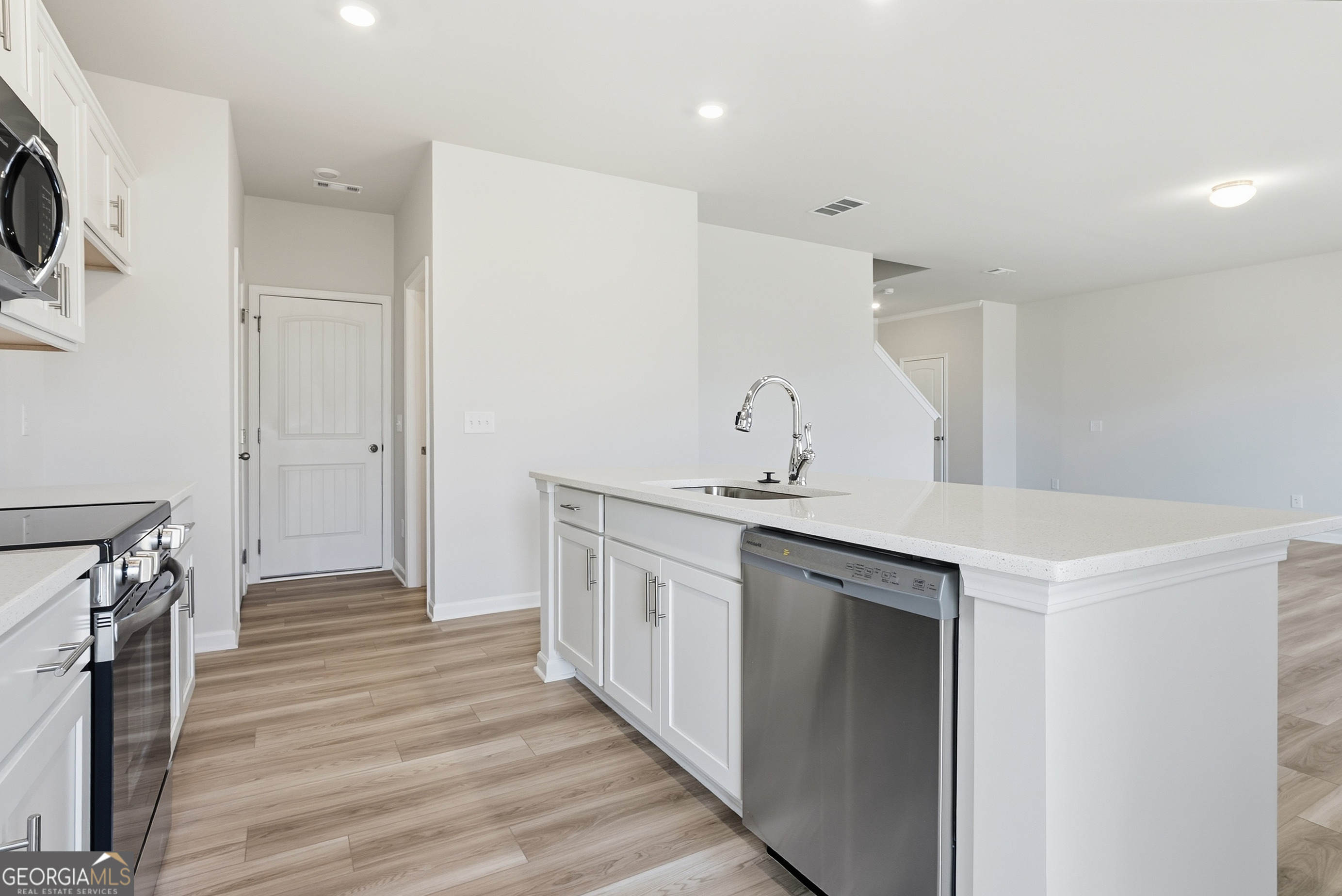 30 Umber Lane Newnan, GA 30263 - Photo 8 of 33 a view of a kitchen from the hallway