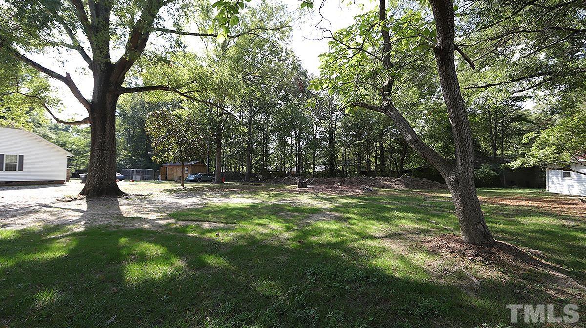 3811 Pickett Road Durham, NC 27705 - Photo 22 of 22 a view of outdoor space with a garden
