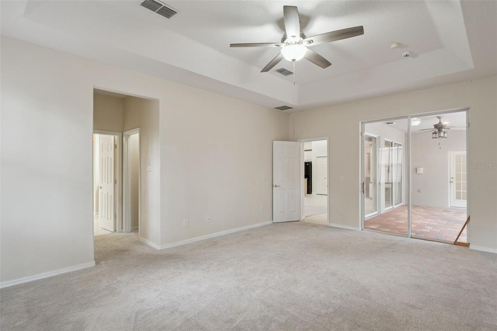 597 Sand Wedge Loop Apopka, FL 32712 - Photo 21 of 40 a view of empty room with fan