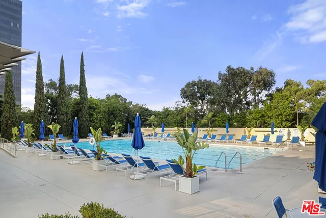a view of a park with sitting area