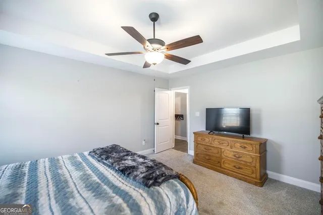 a bathroom with a sink double vanity and a mirror