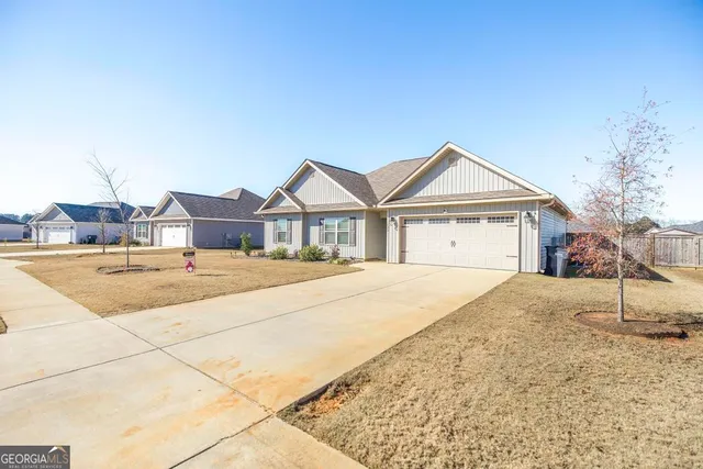 a house with yard in front of it