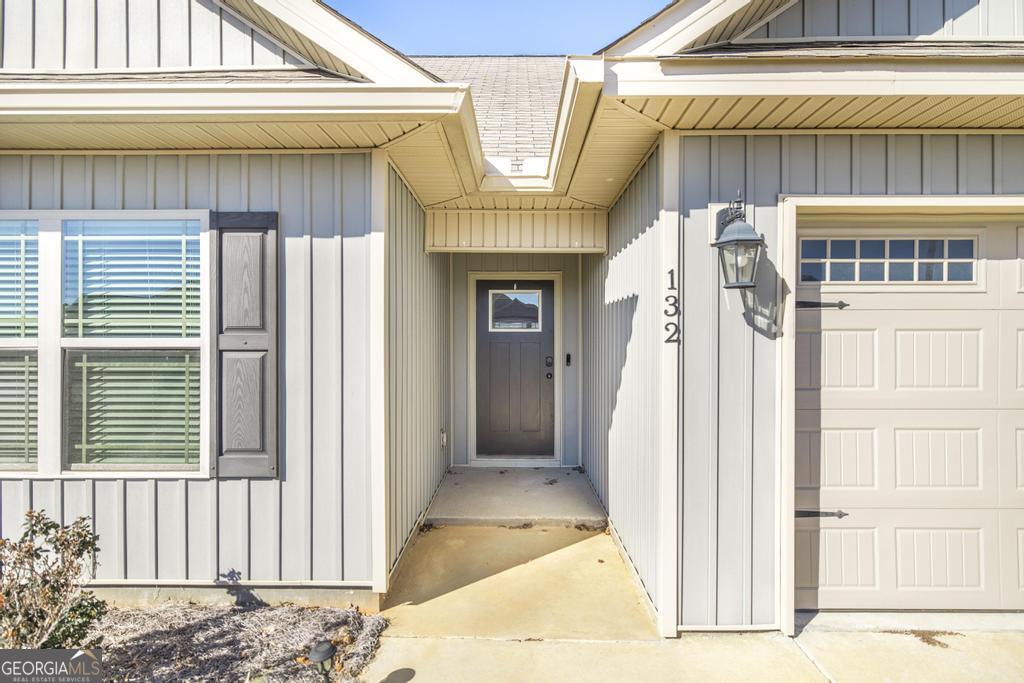 132 Sadie Heights Boulevard Perry, GA 31069 - Photo 6 of 29 a view of front door of house