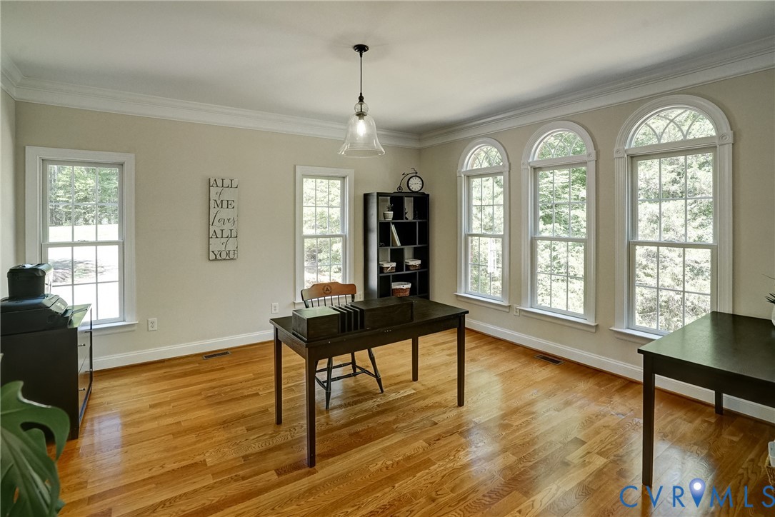 1295 Hermitage Road Manakin-Sabot, VA 23103 - Photo 22 of 55 a living room with furniture and a floor to ceiling window